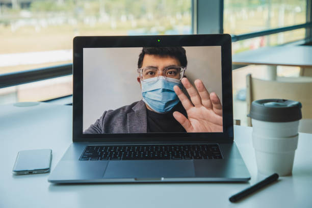 Personal Perspective Shot Of Video Calling An Asian Man Using Laptop