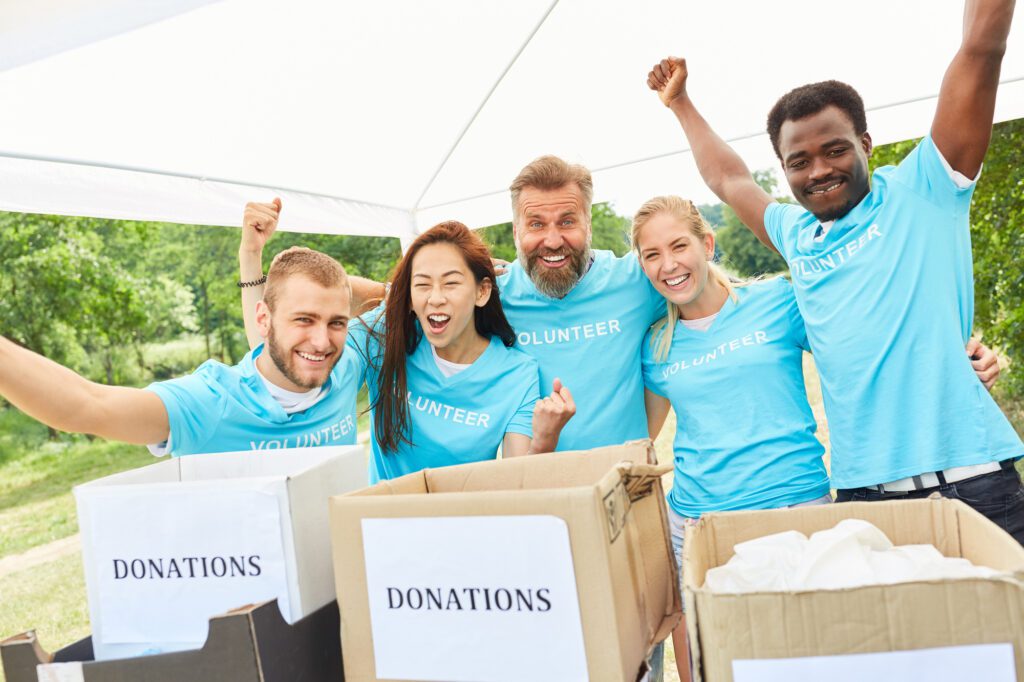 Volunteers Cheer At A Fundraiser