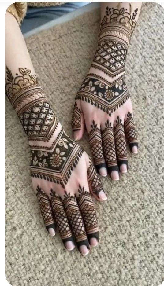 Beautiful woman dressed up as Indian tradition with henna mehndi design on  her both hands to celebrate big festival of Karwa Chauth, Karwa Chauth  celebrations by Indian woman for her husband 16682822