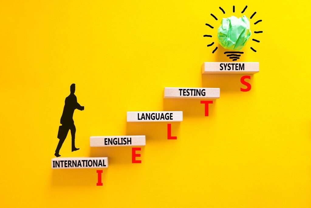 Ielts Symbol. Concept Words Ielts International English Language Testing System On Wooden Block. Beautiful Yellow Background. Business Ielts International English Language Testing System Concept.